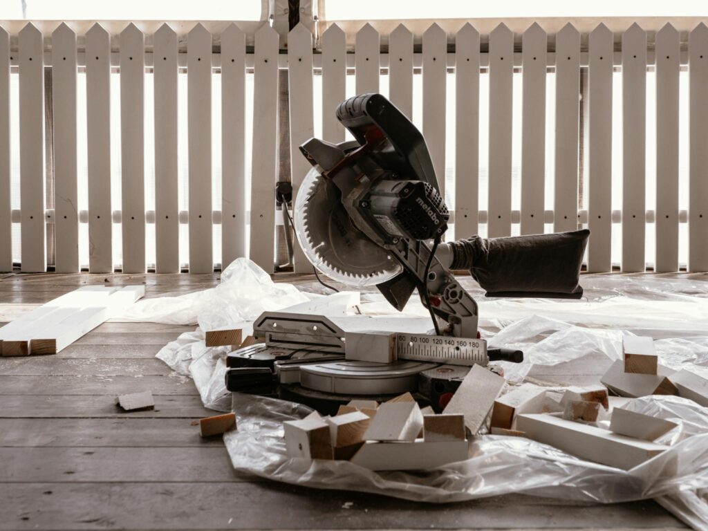 Tools on Terrace near Wooden Fence